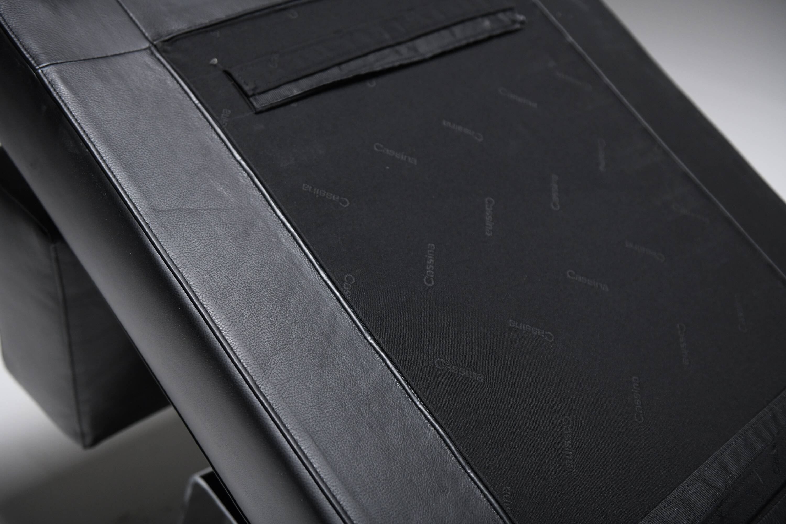 Black leather Ombra 512 lounge chairs by Charlotte Perriand for Cassina Italy