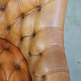 Sheepskin Chesterfield armchair with elegant design and lots of character