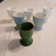 6 mismatched old egg cups
