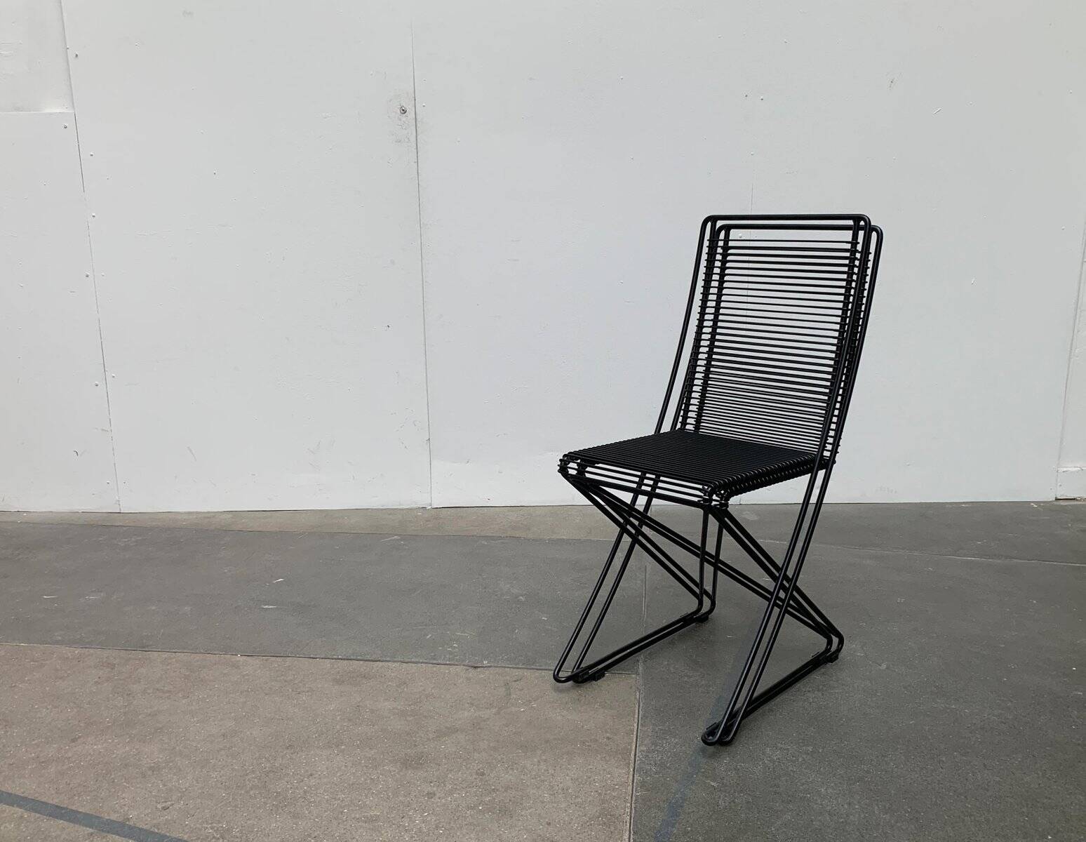 Set of black postmodern Kreuzschwinger chairs by Till Behrens for Schlubach, 1980s.