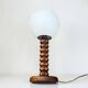 Wooden lamp in wabi-sabi brutalist style by Charles Dudouyt with white opaline.