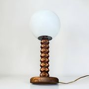 Wooden lamp in wabi-sabi brutalist style by Charles Dudouyt with white opaline.