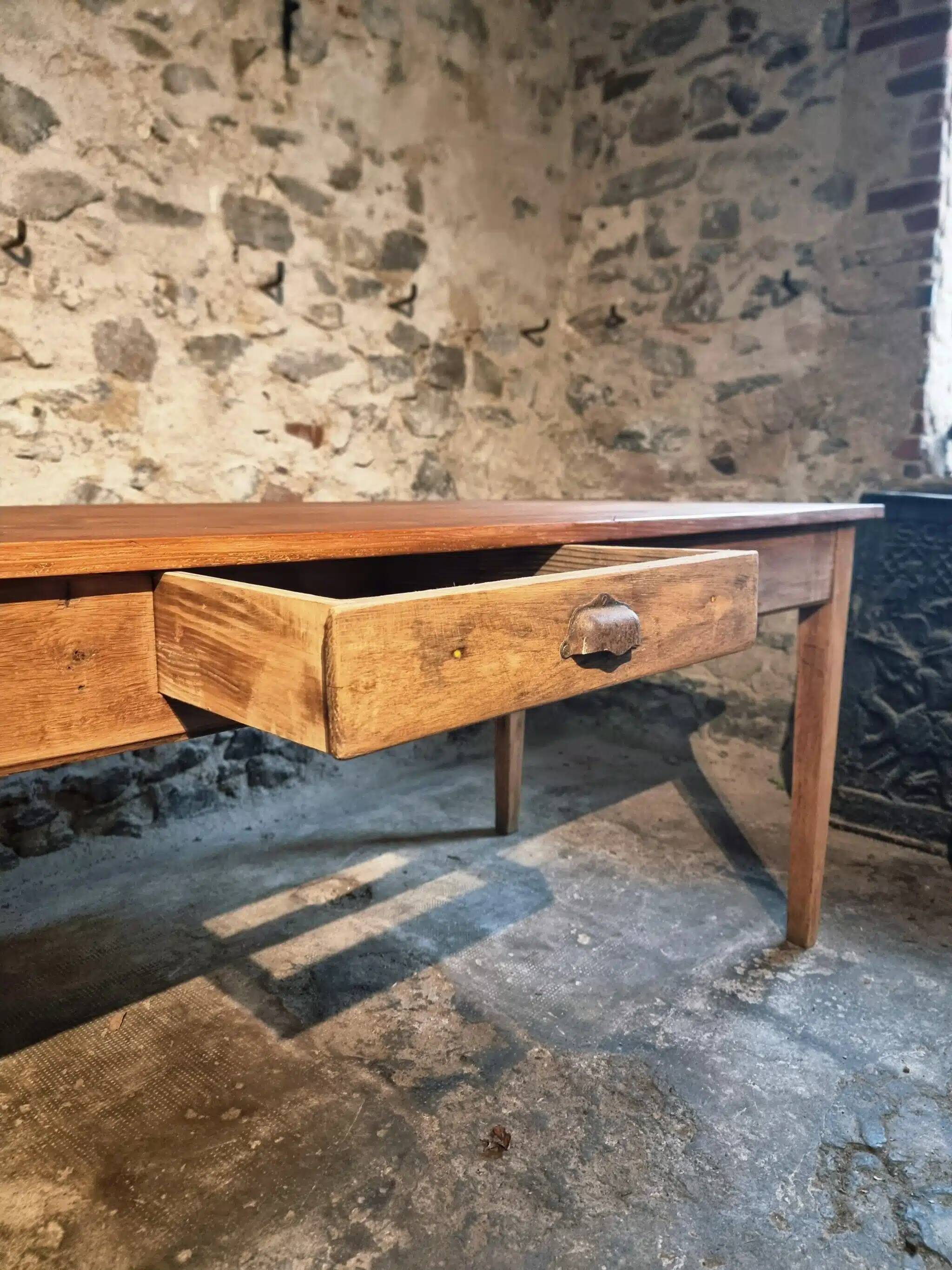 Antique French farmhouse dining table in oak and pine, circa 1900