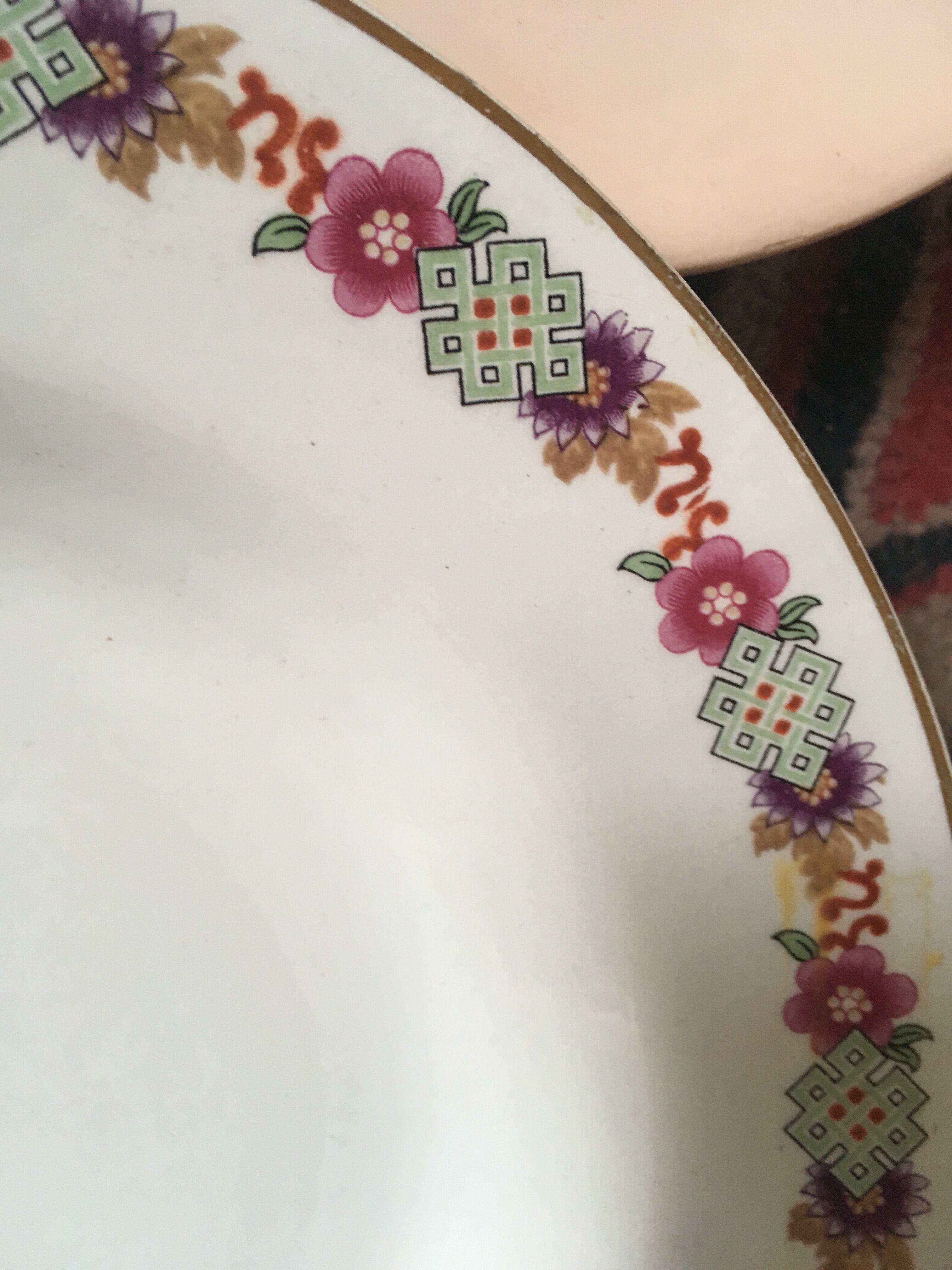 Old hollow plates matched in pink.