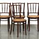 4 antique wooden and cane bistro chairs