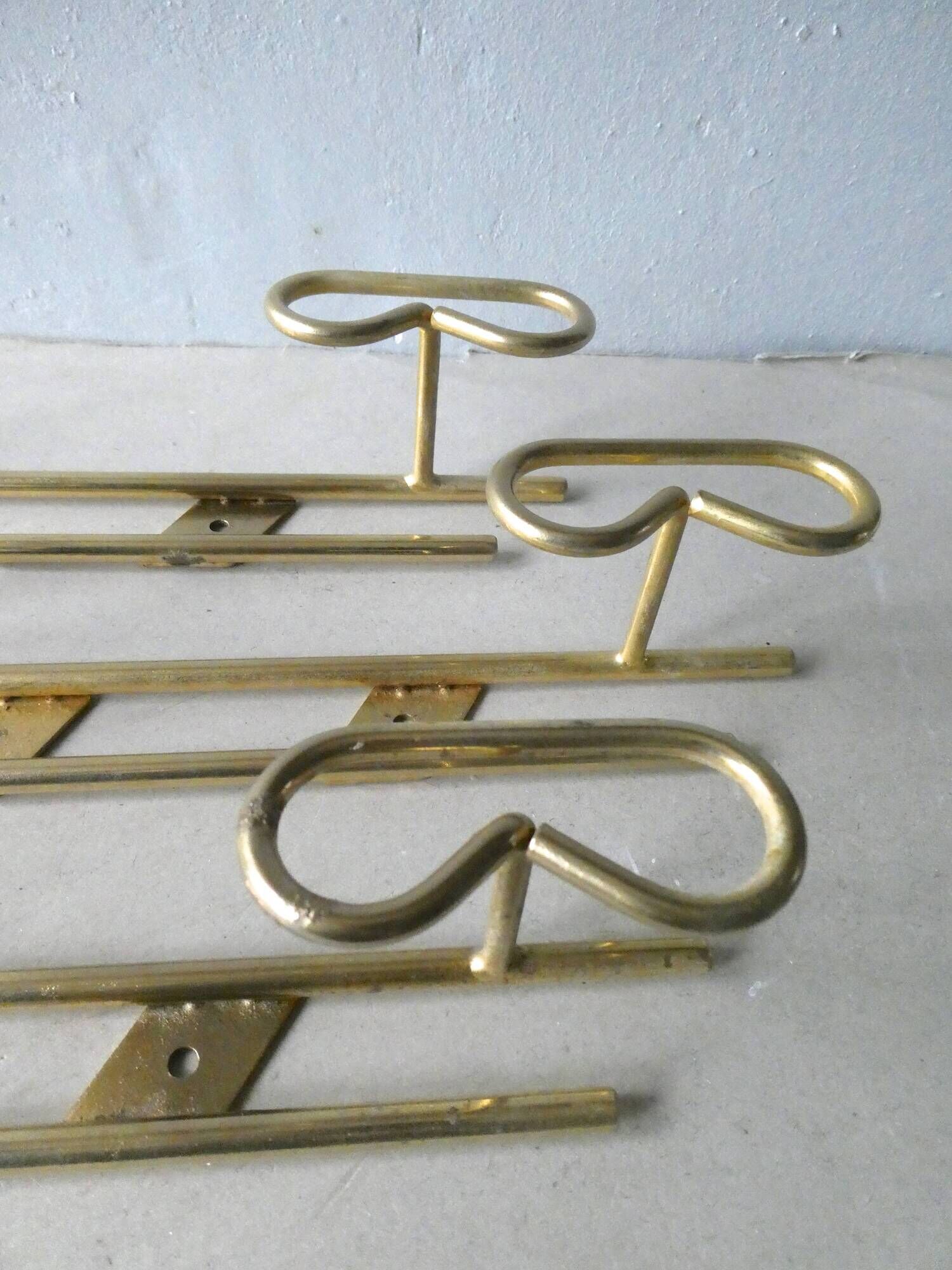 Set of 3 coat hangers in gold metal, 60s