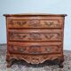 Commode Rocaille en noyer sculpté XXème