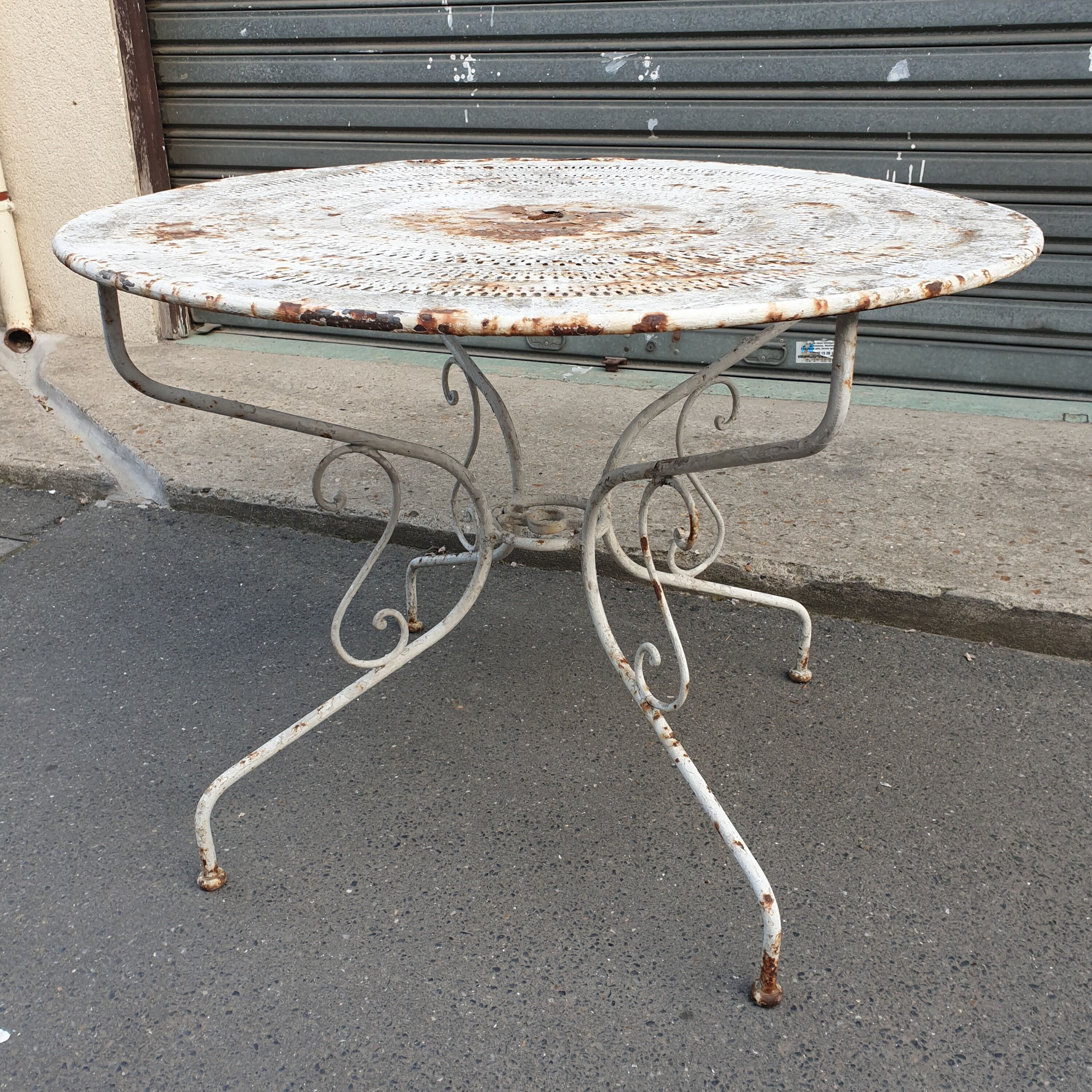Old wrought iron garden table