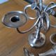 Ercuis pair of candlesticks model Cheverny in silver-plated metal with hunting horn decoration.