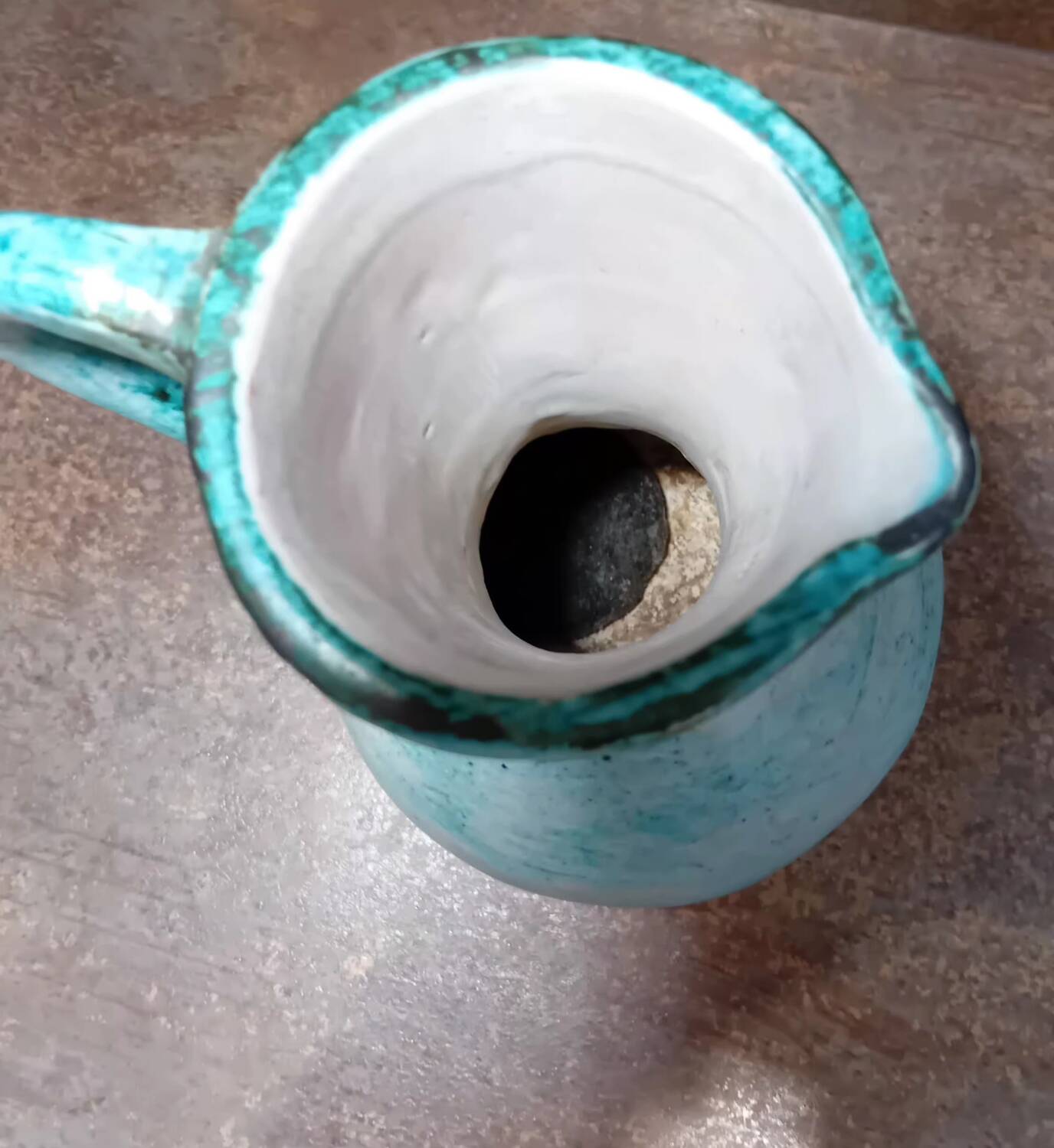 Turquoise ceramic pitcher vase