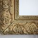 Gilded wooden and stucco frame