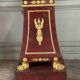 Pair of plaster bases imitating porphyry and gilded bronze circa 1980.