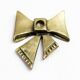 Brass bow tie candle holder 1970