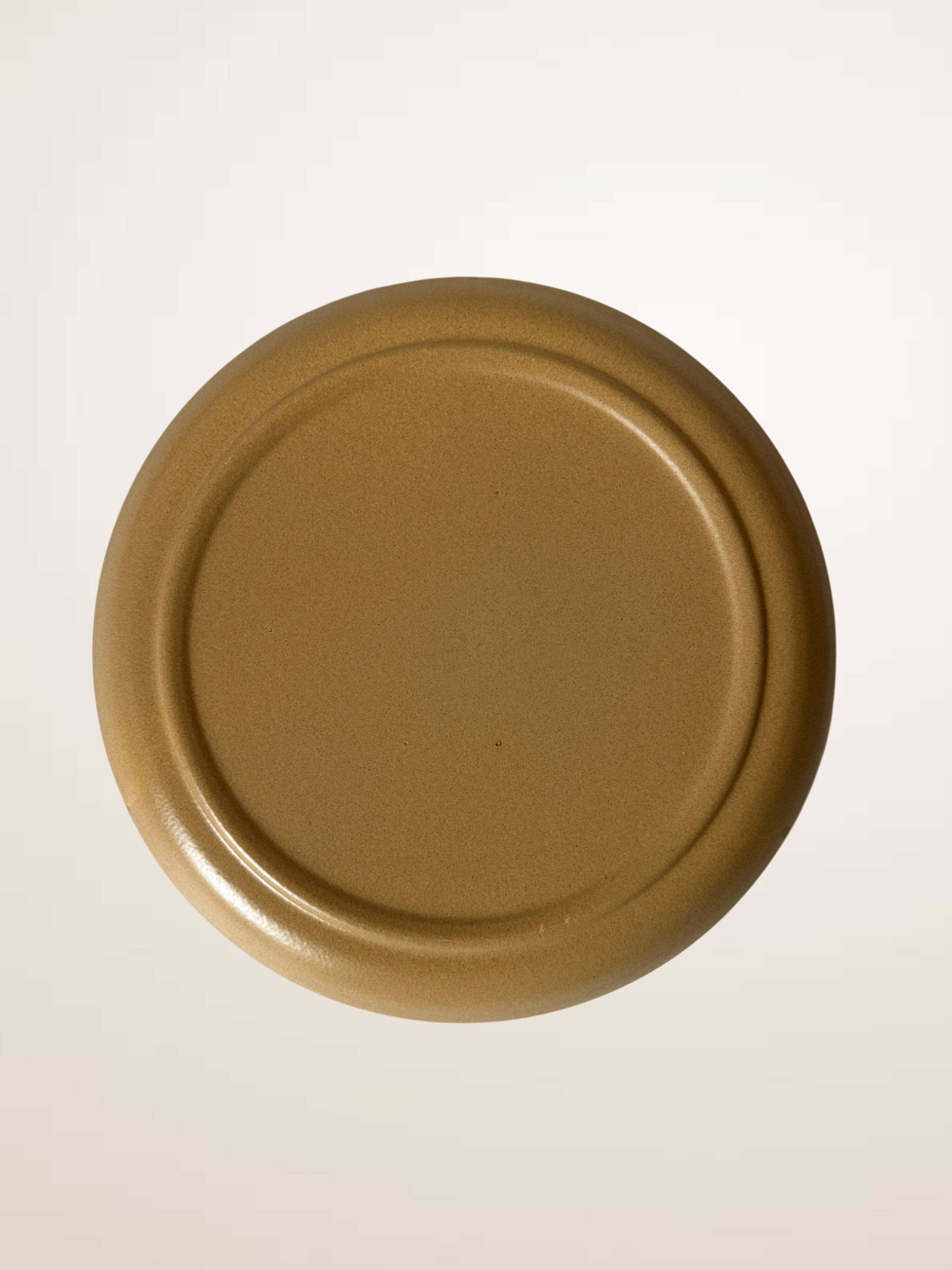 Set of six glazed stoneware dessert plates.