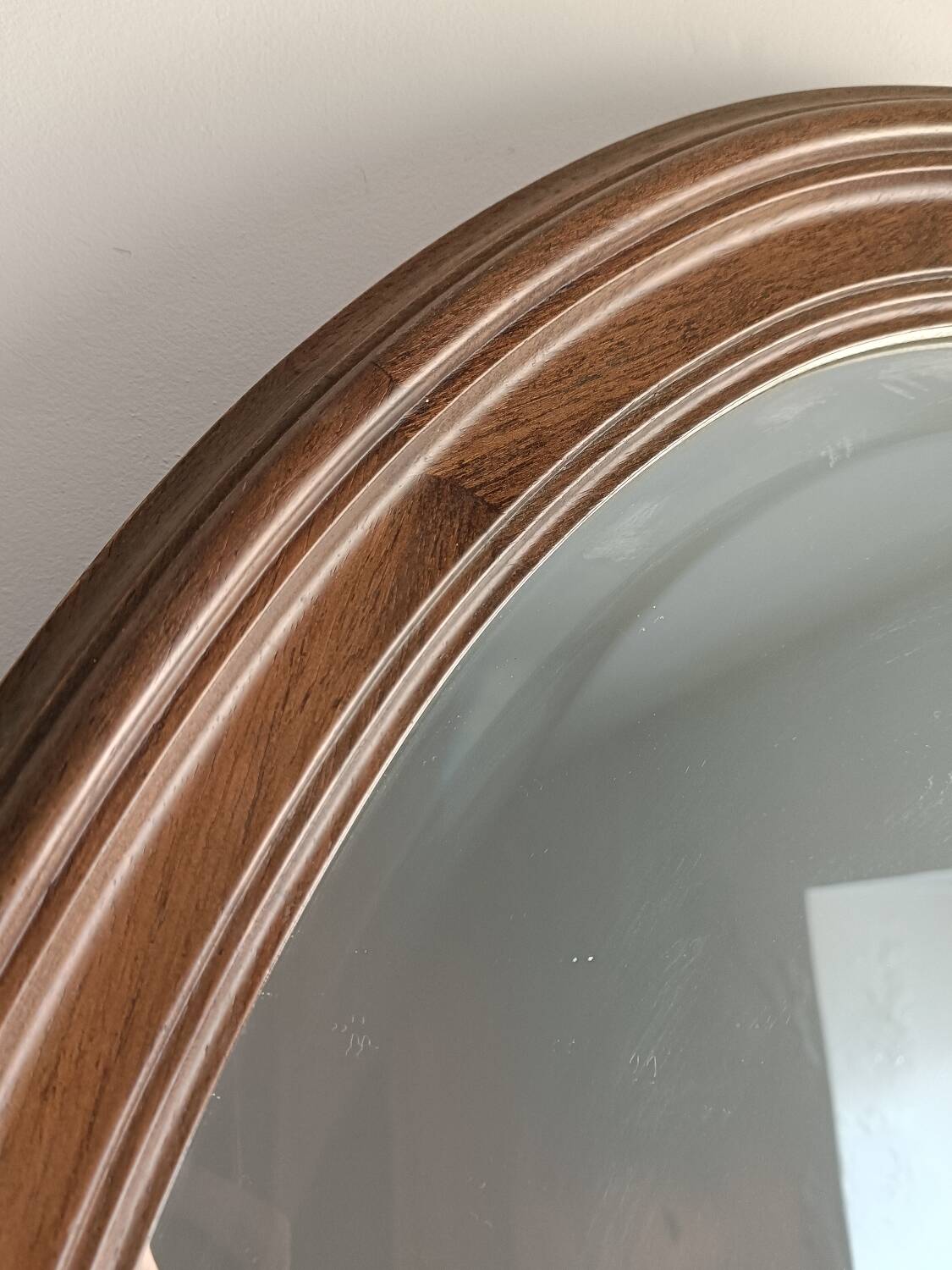 Antique oval beveled mirror