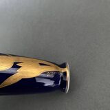 Pair of 1900 Limoges vases with blue background and gold highlights, R. Rosier decorations
