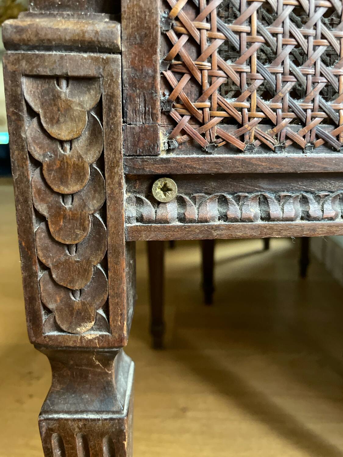 Pair of gondola armchairs in Louis XVI style with caning.