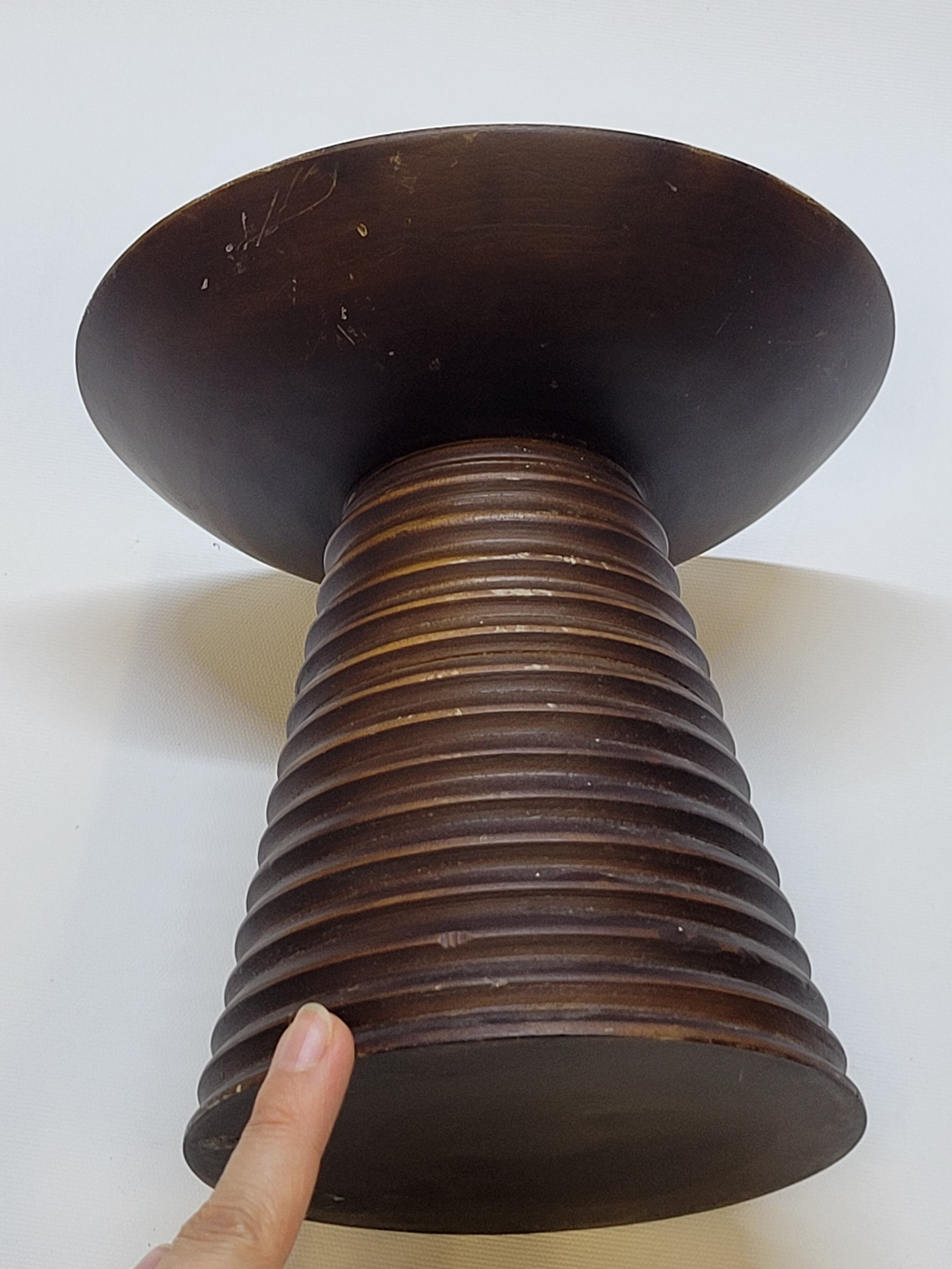 Scandinavian wooden candle holder turned sleek design