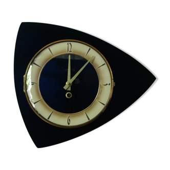 Famous black vintage mechanical wall clock