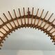 Round rattan mirror