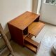 Danish storage cabinet Komfort on teak and rosewood wheels