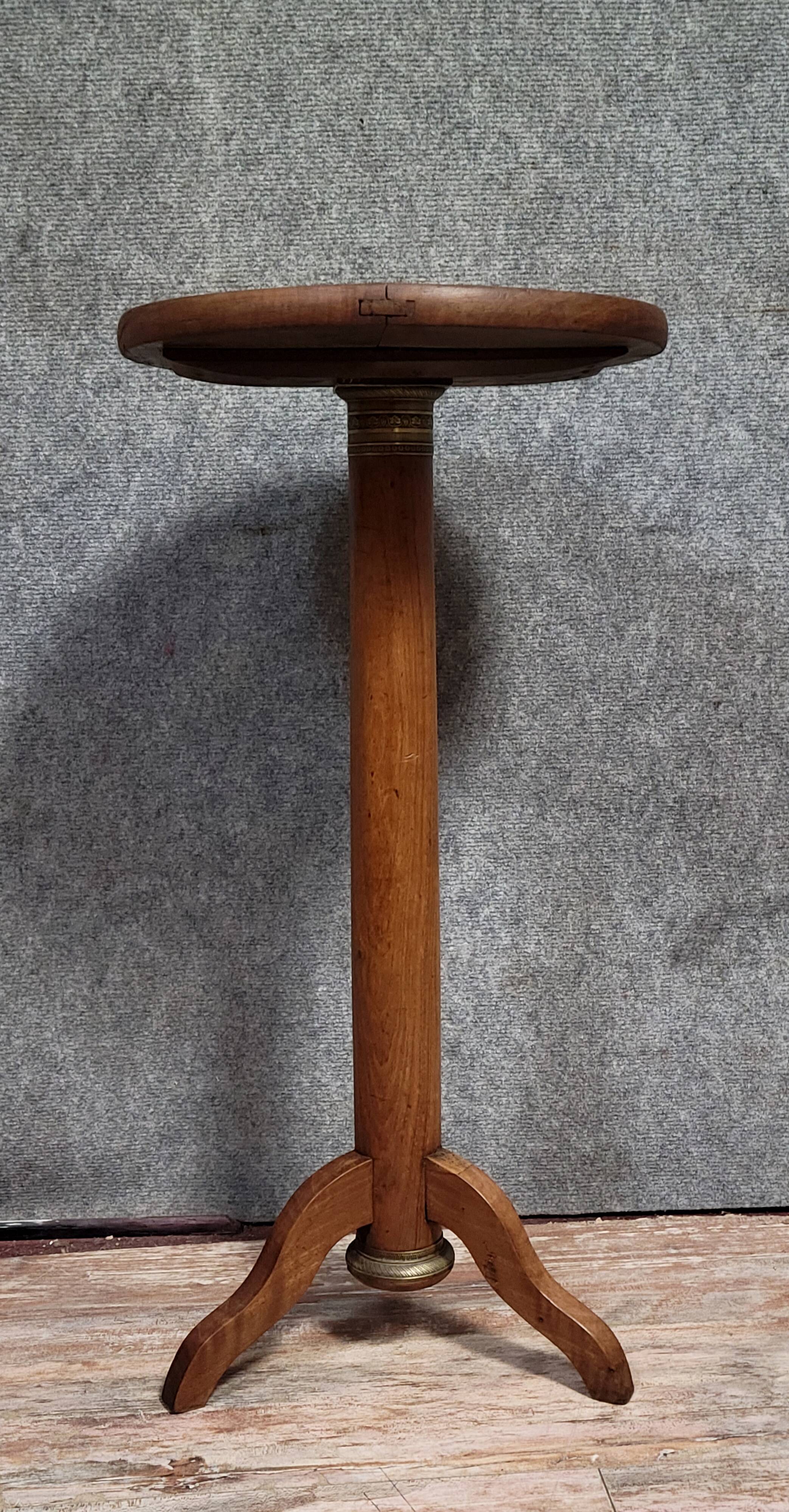 Empire period pedestal table in solid wood and gilt bronze