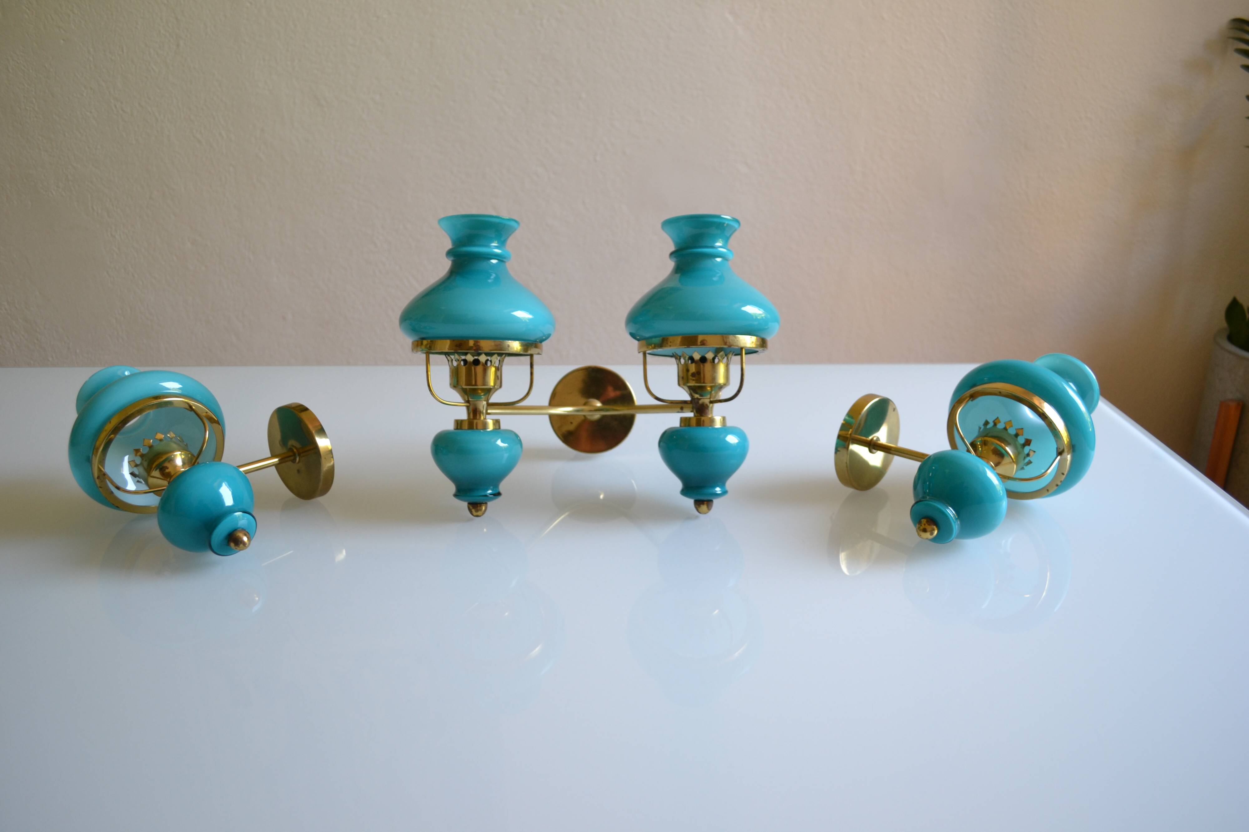 Series of 3 vintage brass and blue opaline wall lamps