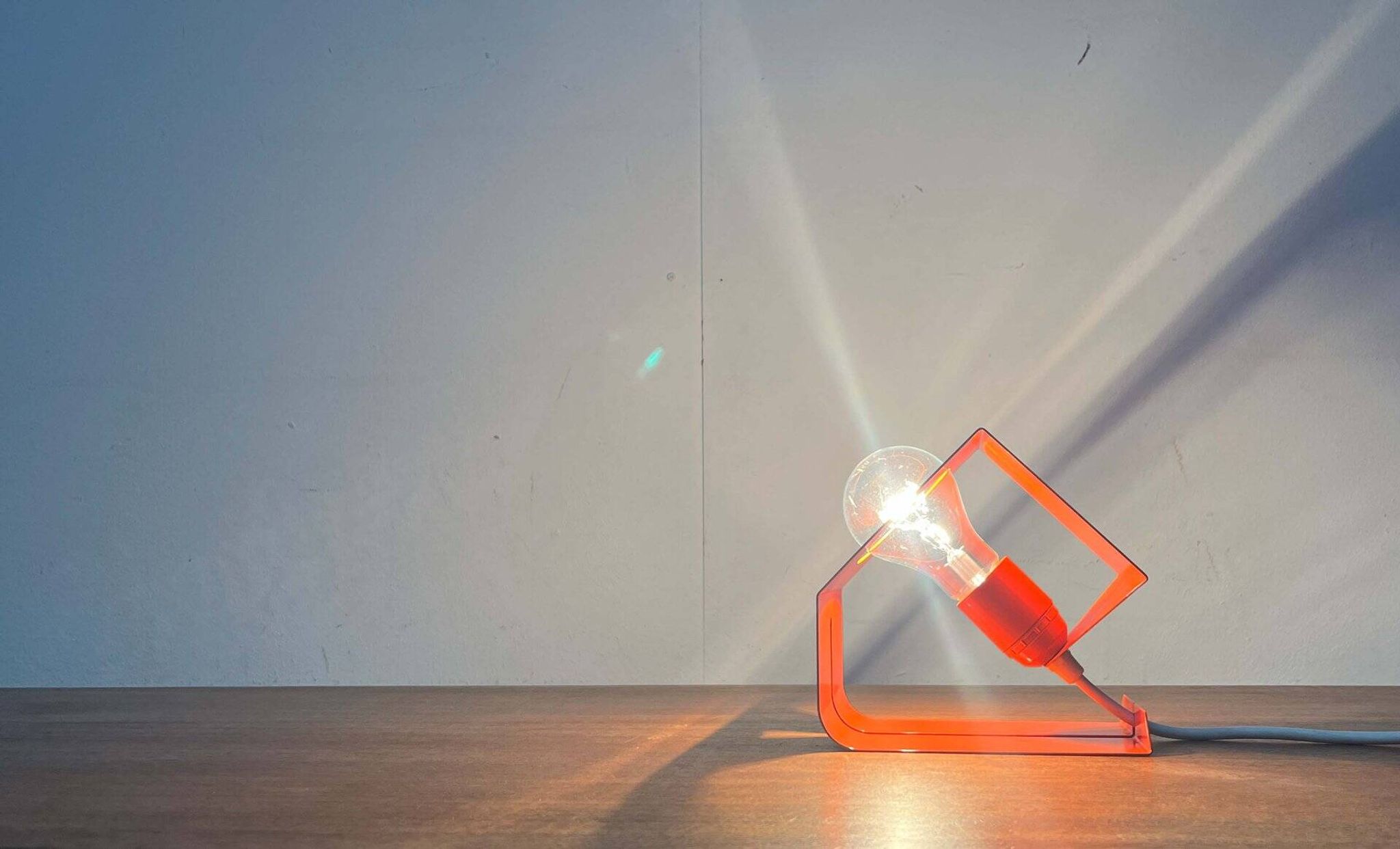 Orange metal table lamp, minimalist, modern mid-century space age, 1960s.