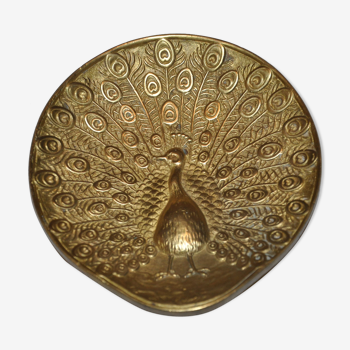 Brass pocket with peacock decoration