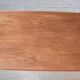 Danish 1960s teak coffee table with slatted shelf.
