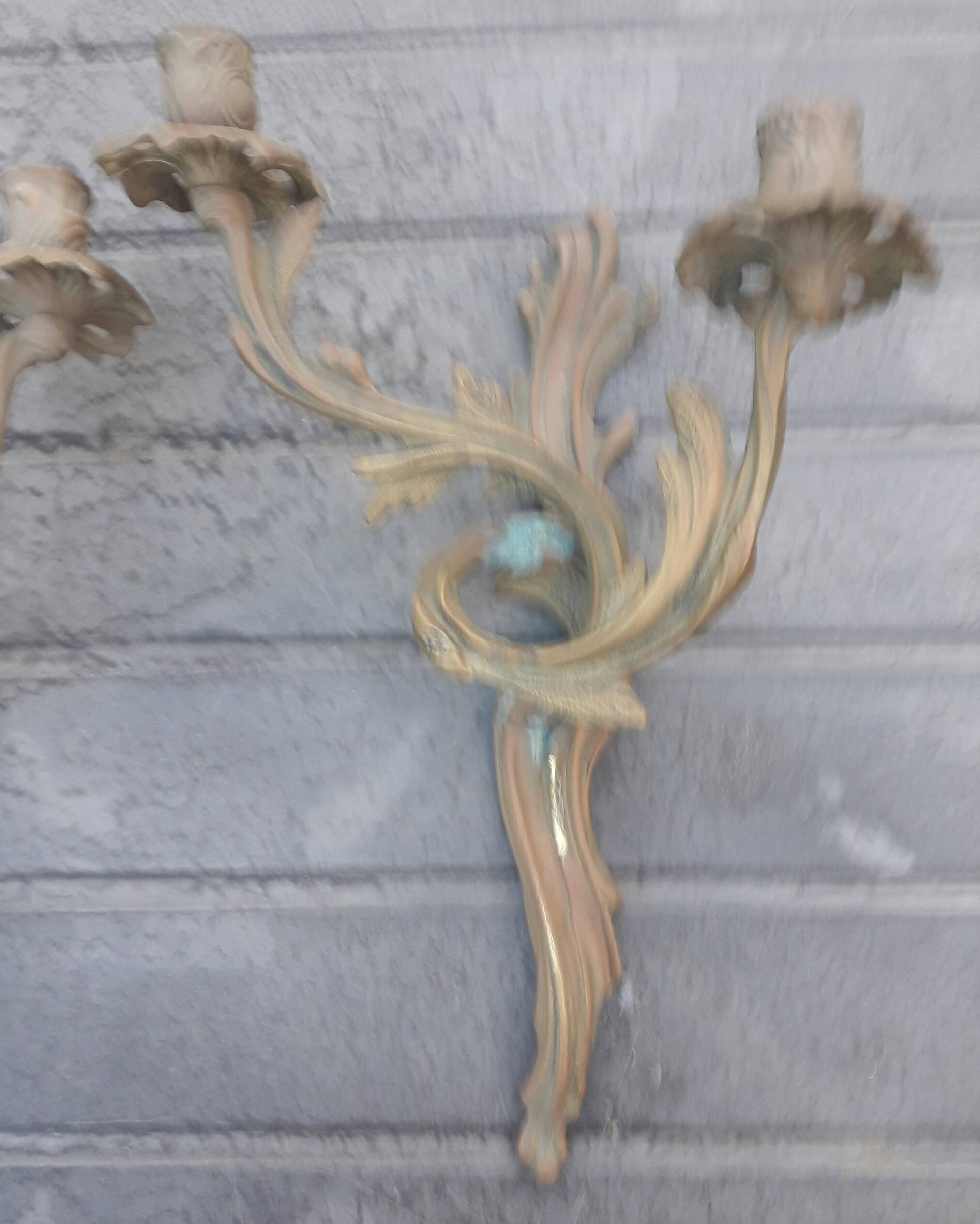 Pair of Louis XV style bronze sconces