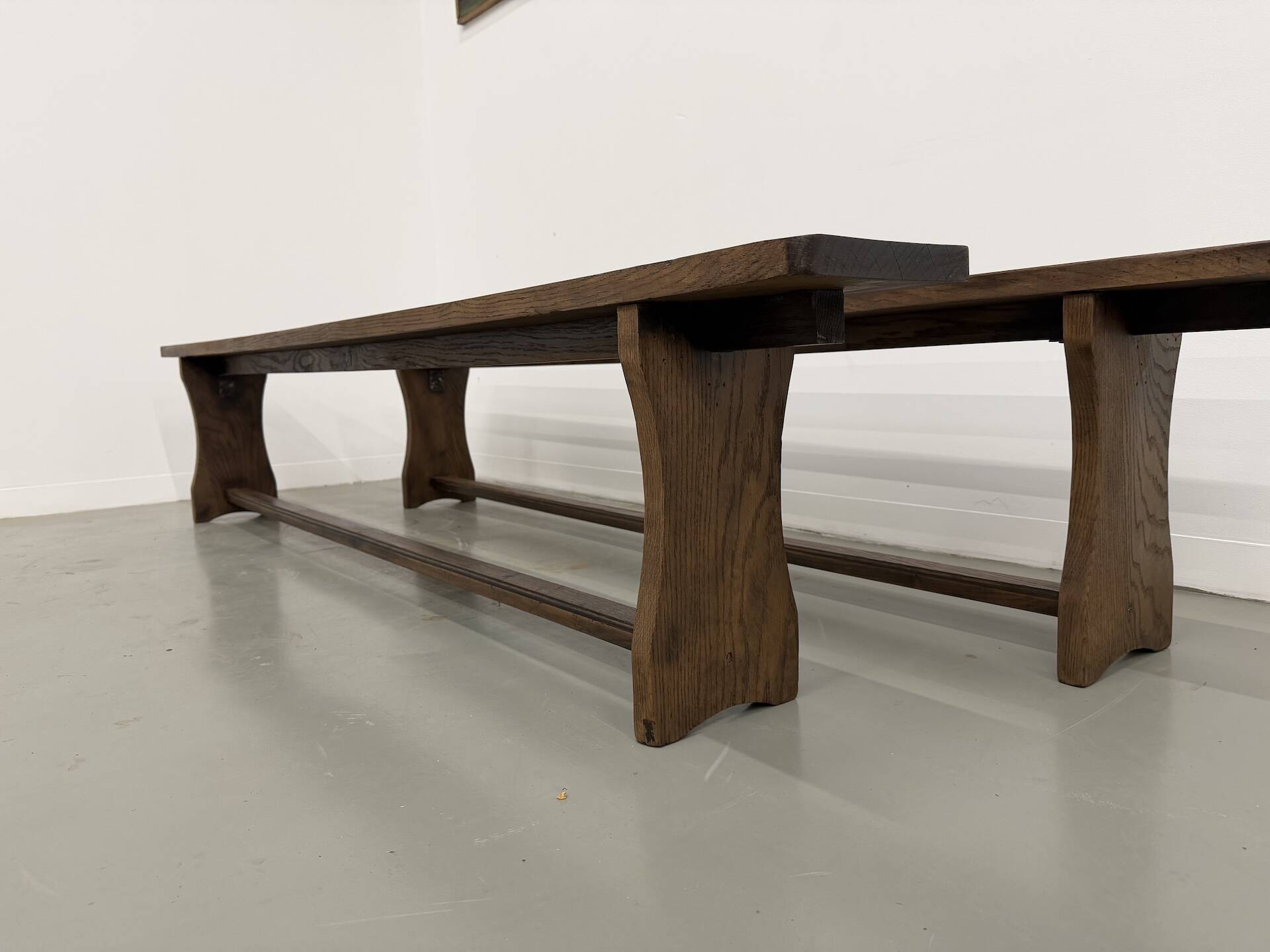 Pair of solid oak benches, winged legs, France, 1970s