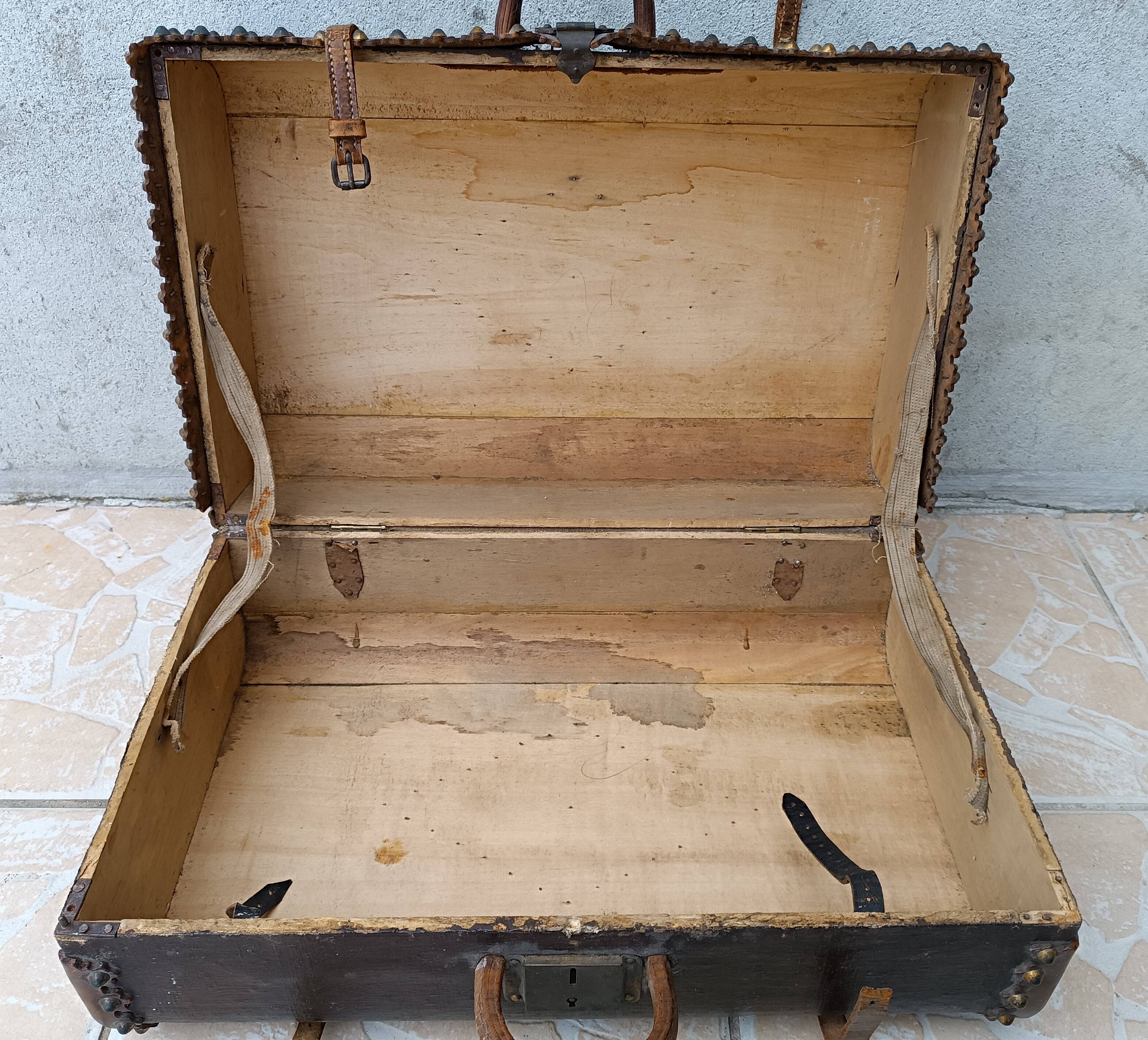 Antique wooden and leather travel trunk