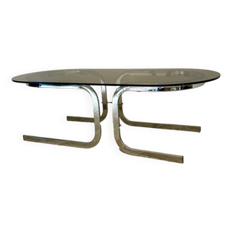 Oval chrome coffee table and 70's smoked glass top