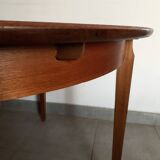 Scandinavian round teak dining table from the 60s extendable