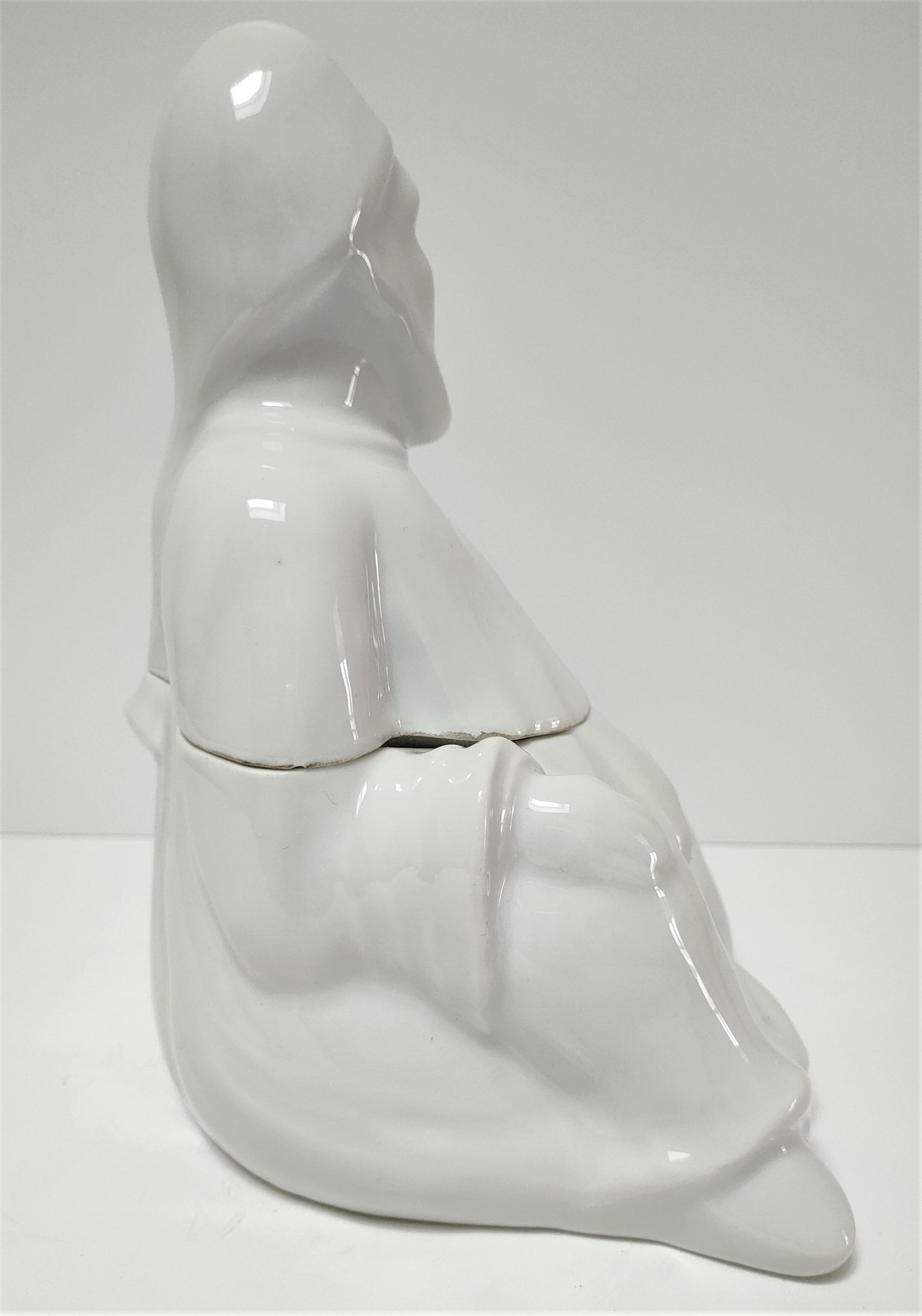 Anthropomorphic porcelain pot signed Baylac late nineteenth early twentieth