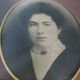 Old photo portrait framed in wood and stucco