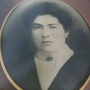 Old photo portrait framed in wood and stucco
