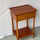 Vintage solid wood pedestal table with niche and drawer