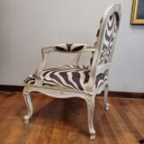 Pair of armchairs, carved and polychrome wood, printed zebra tapestry, Louis XV, circa 1790 – France