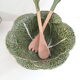 Vintage salad bowl in dabbling cabbage leaf and cutlery