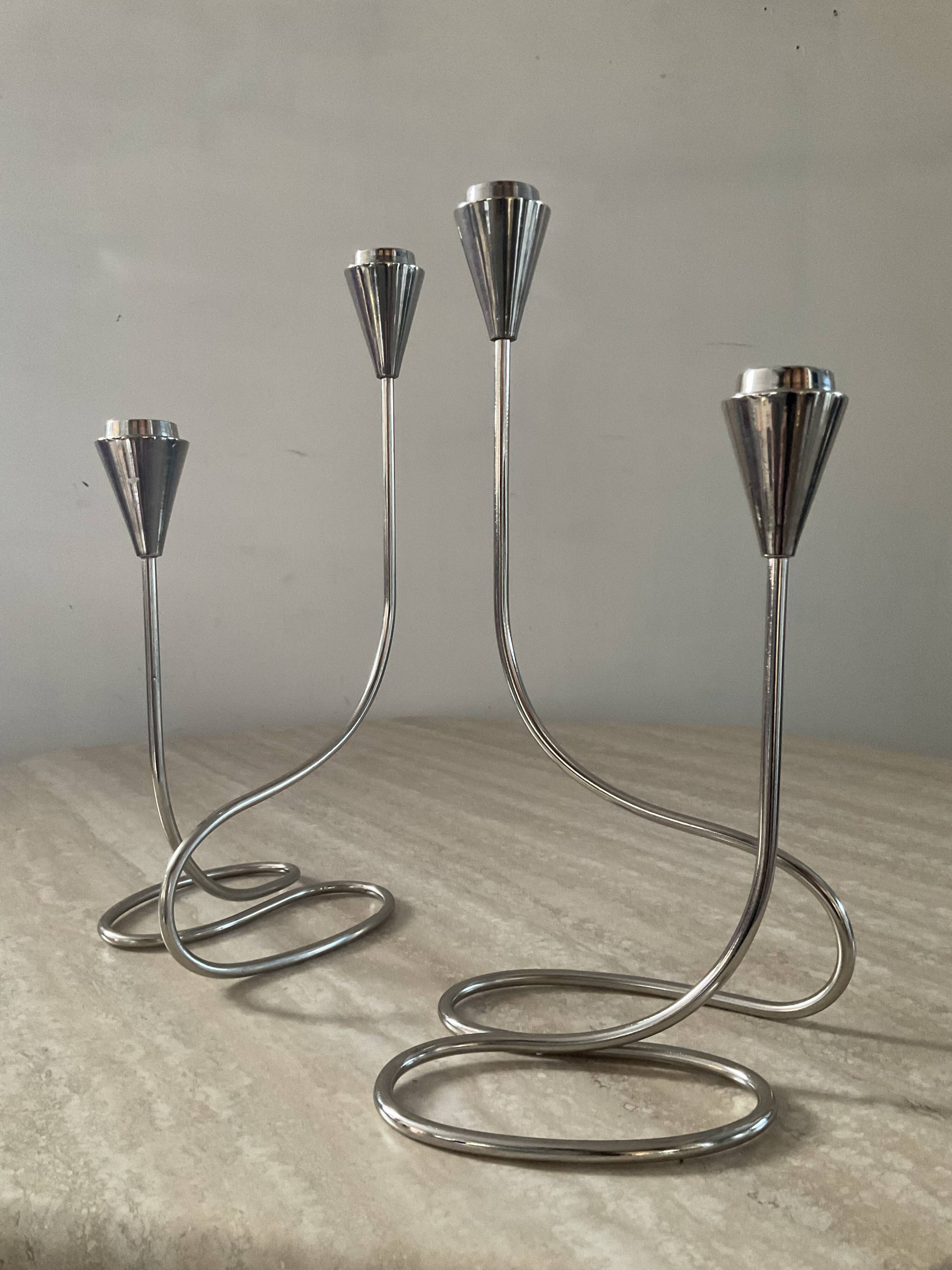 Pair of modernist silver metal candlesticks