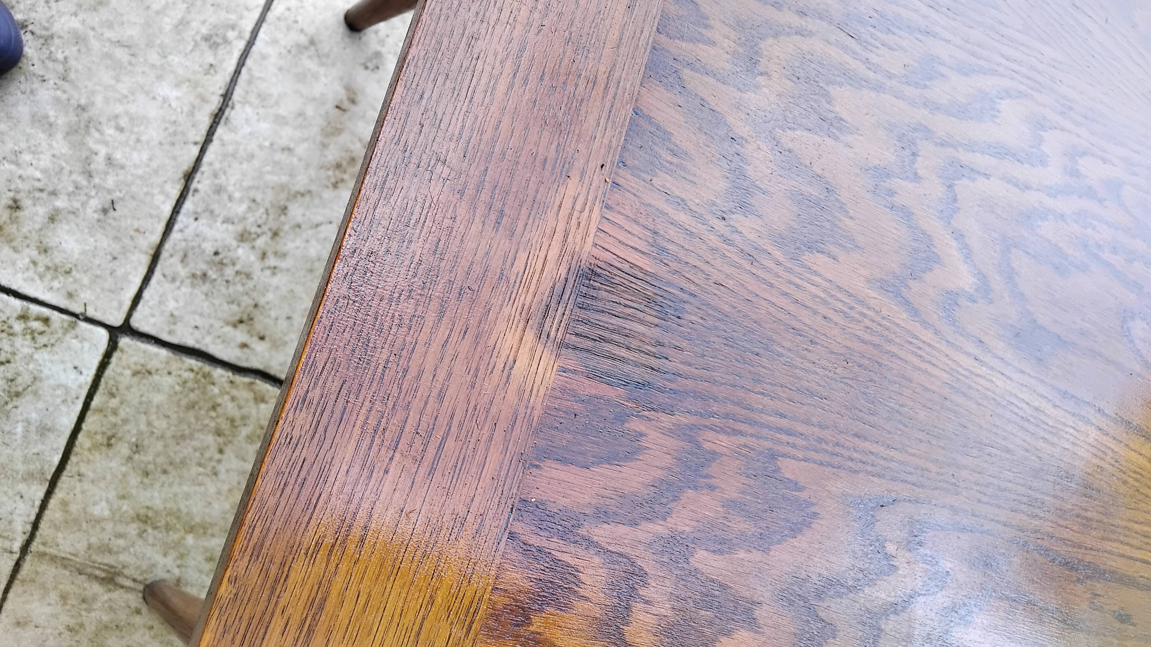 Vintage oak table with tapered legs.