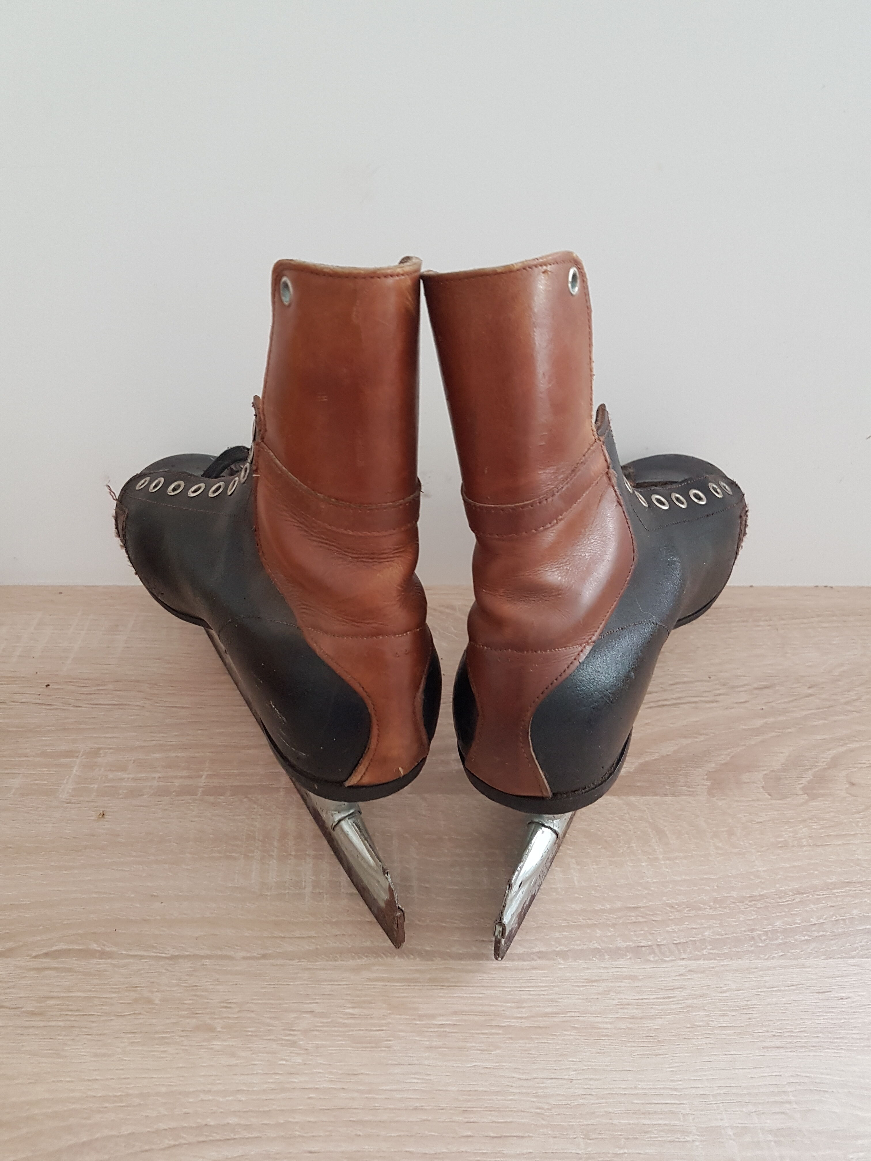 Pair of black and brown ice skates