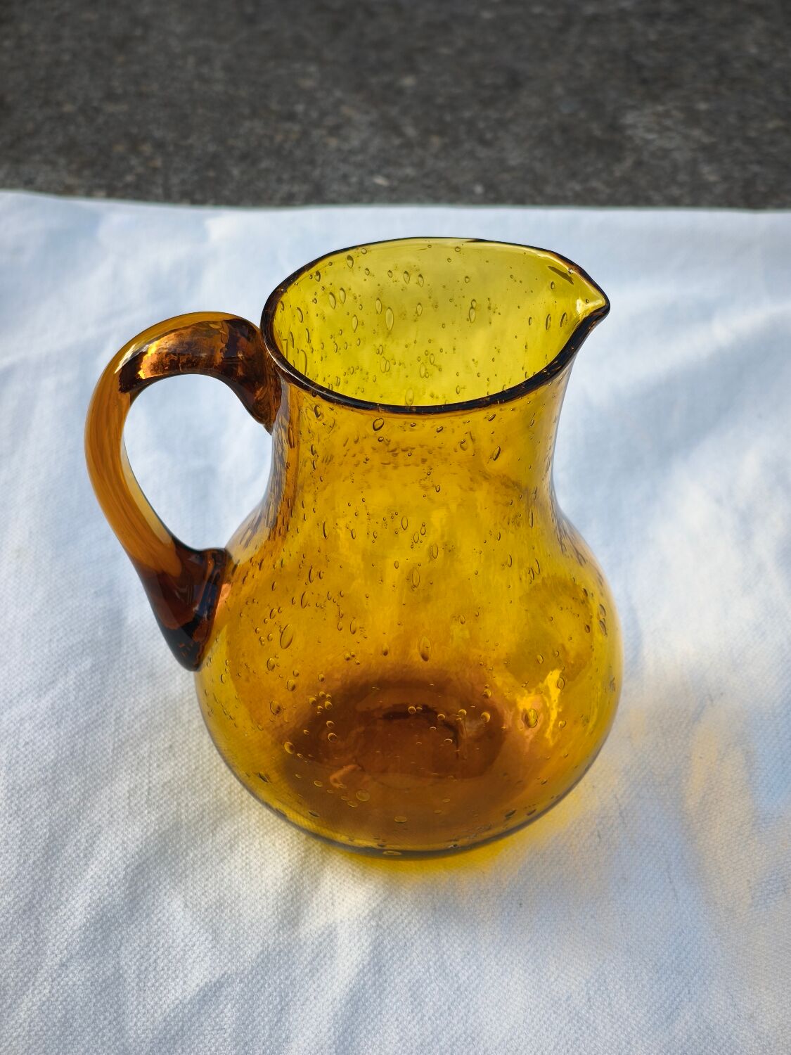 Hand-blown glass pitcher