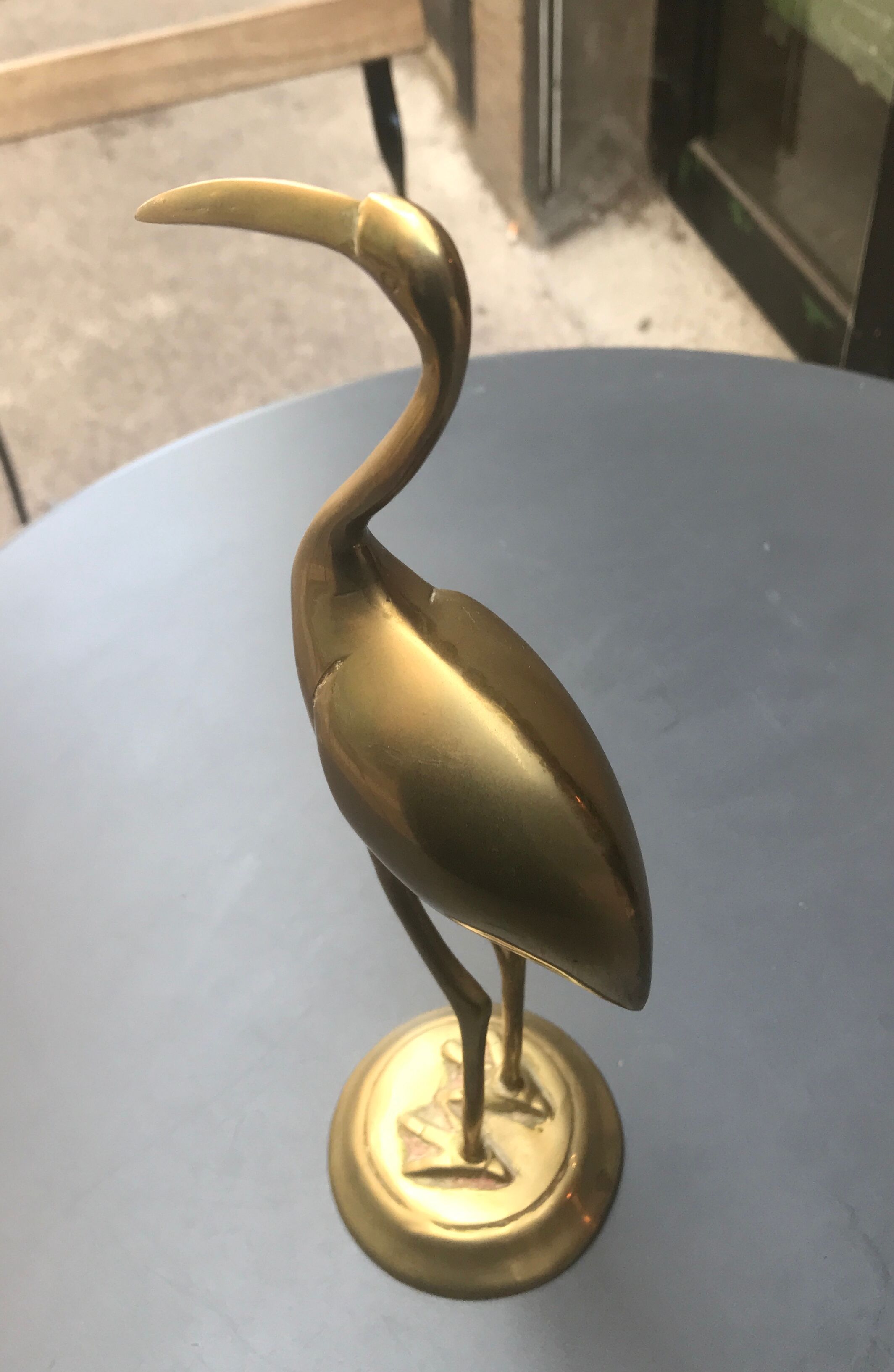 Large brass stilt walker