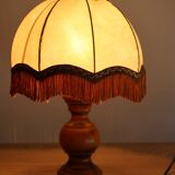 Table lamp in turned wood and umbrella-style leather lampshade