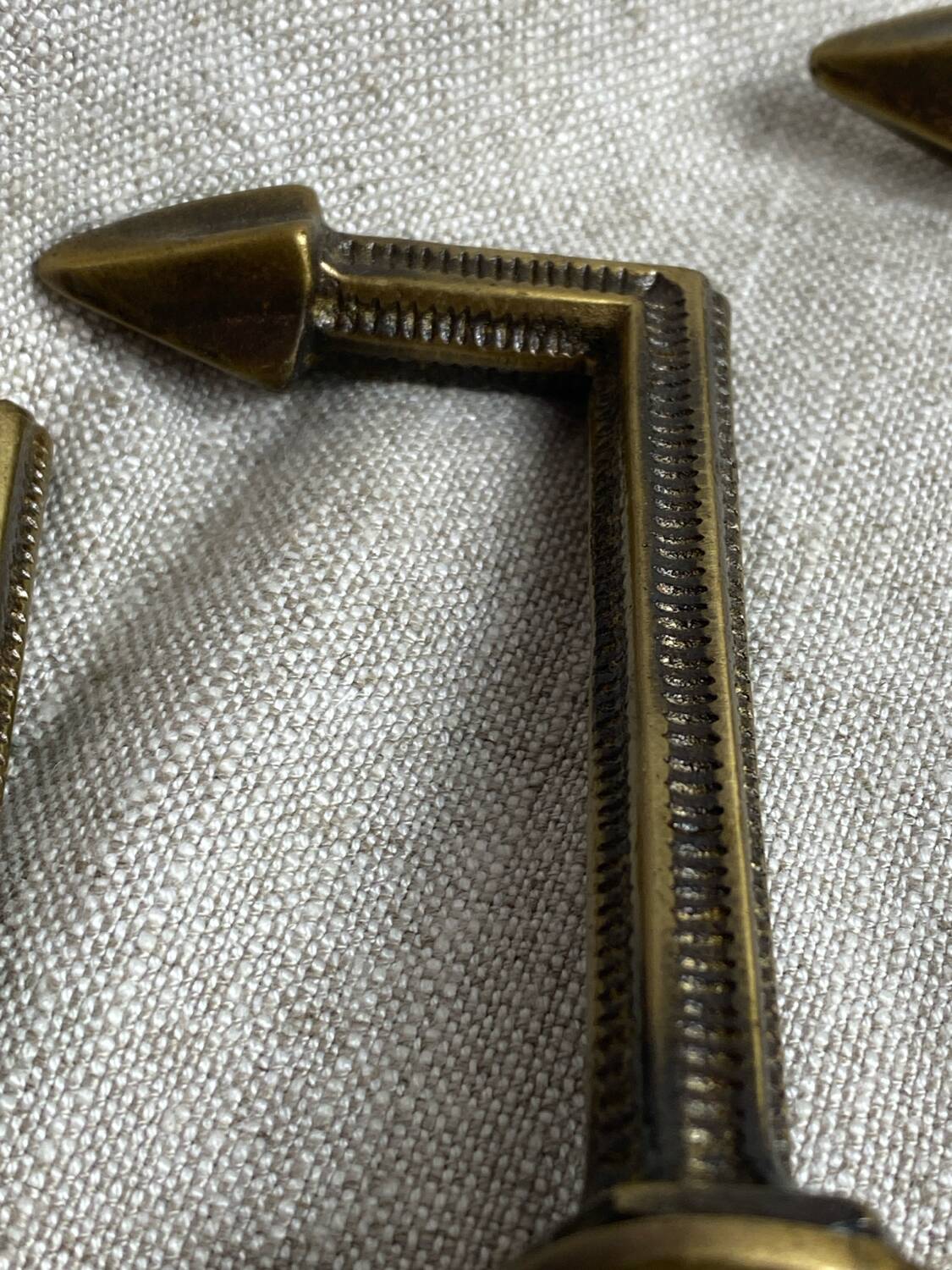 Antique brass curtain hooks and tiebacks