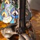 antique wrought iron floor lamp, 1900 to 1940 with stained glass lampshade