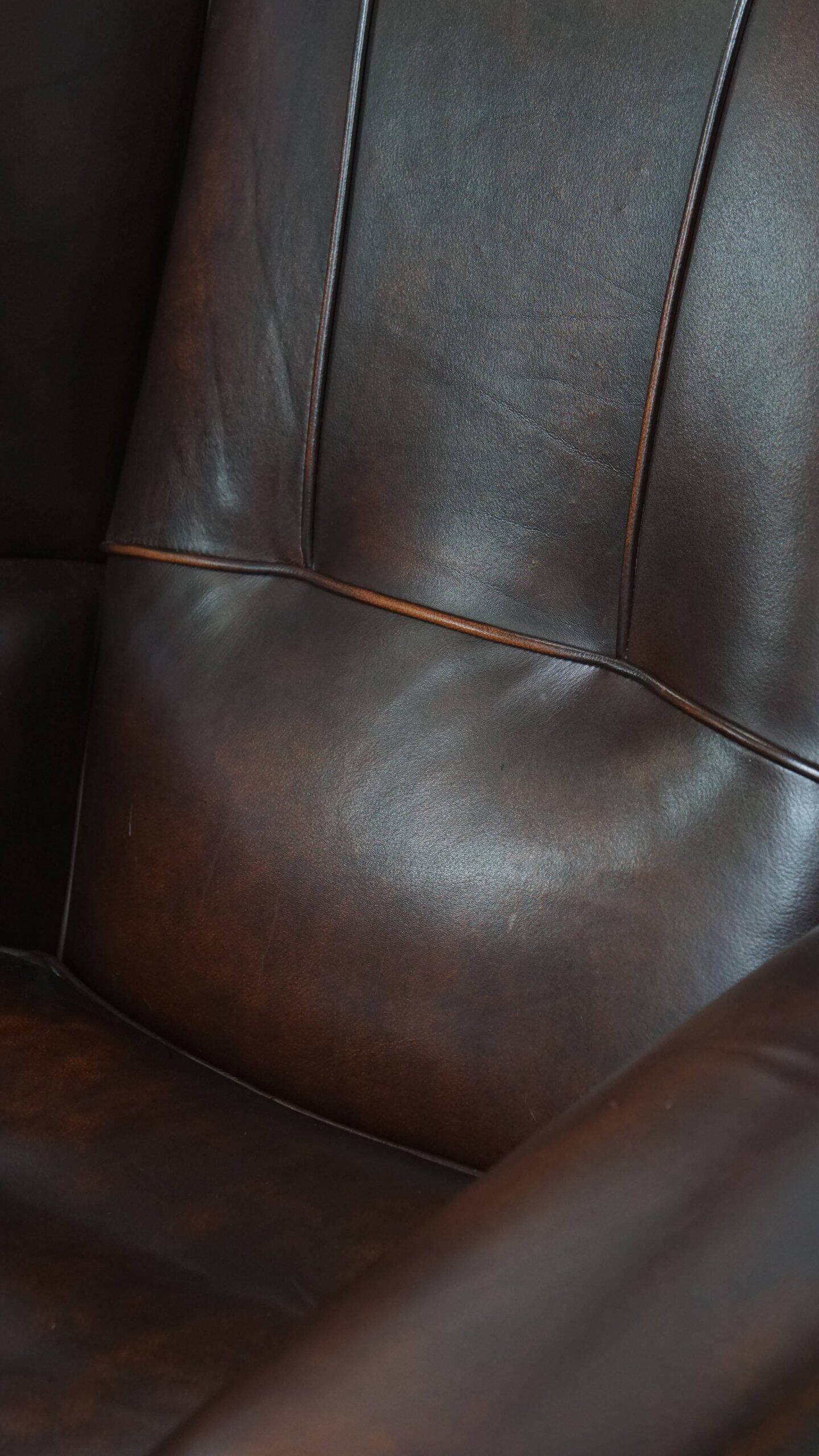 Very beautiful wing chair made of cowhide leather in English style